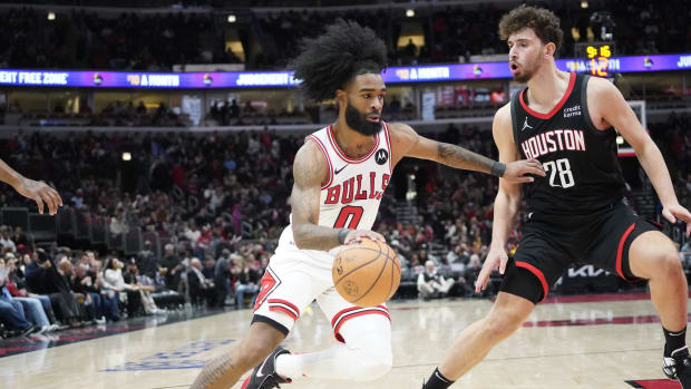 Houston Rockets center Alperen Sengun (28) defends Chicago Bulls guard Coby White (0) during the second half at United Center